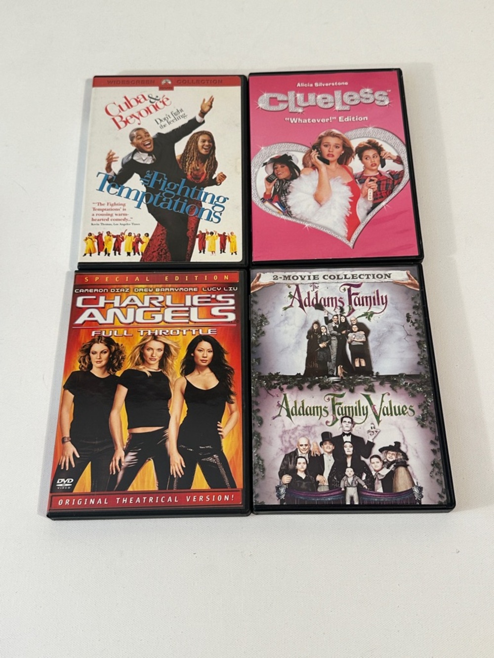 4 ASSORTED DVDS